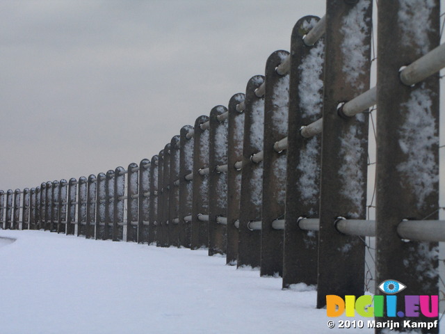 SX12165 Snow on side of pillars of guardrail